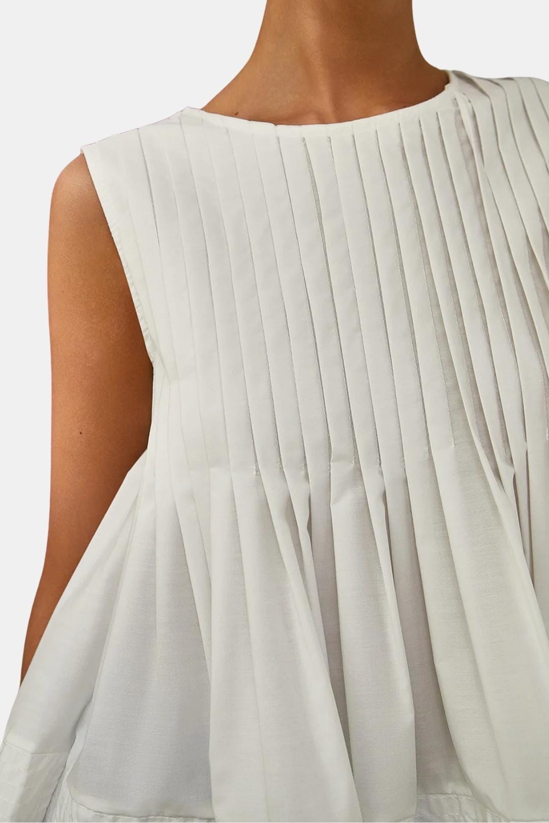 Elodia – Pleated Peplum Sleeveless Blouse